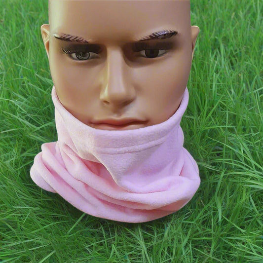 A pink fleece neck warmer displayed on a mannequin man's neck.