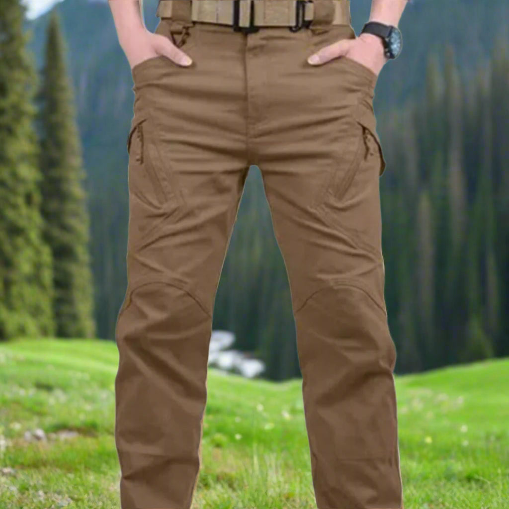 A pair of stretchable trousers in brown color displayed with a price tag in red text, indicating sizes XL, 2XL, and 3XL are available.