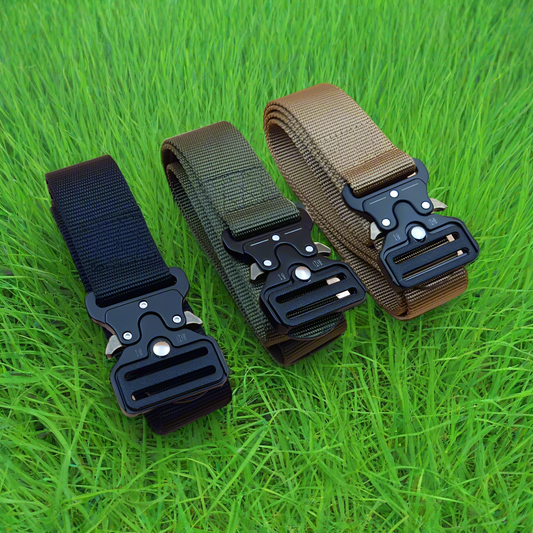 Three tactical belts with different color options on a forest floor background
