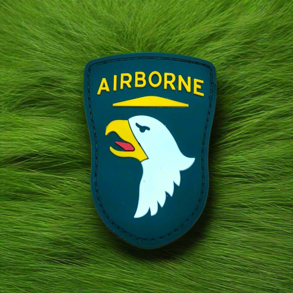 Airborne patch with an eagle design on a green fur background