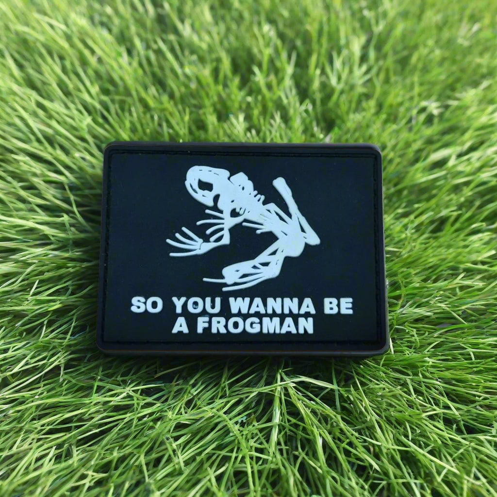 Patch with frogman skeleton design and text 'So you wanna be a frogman' on grass