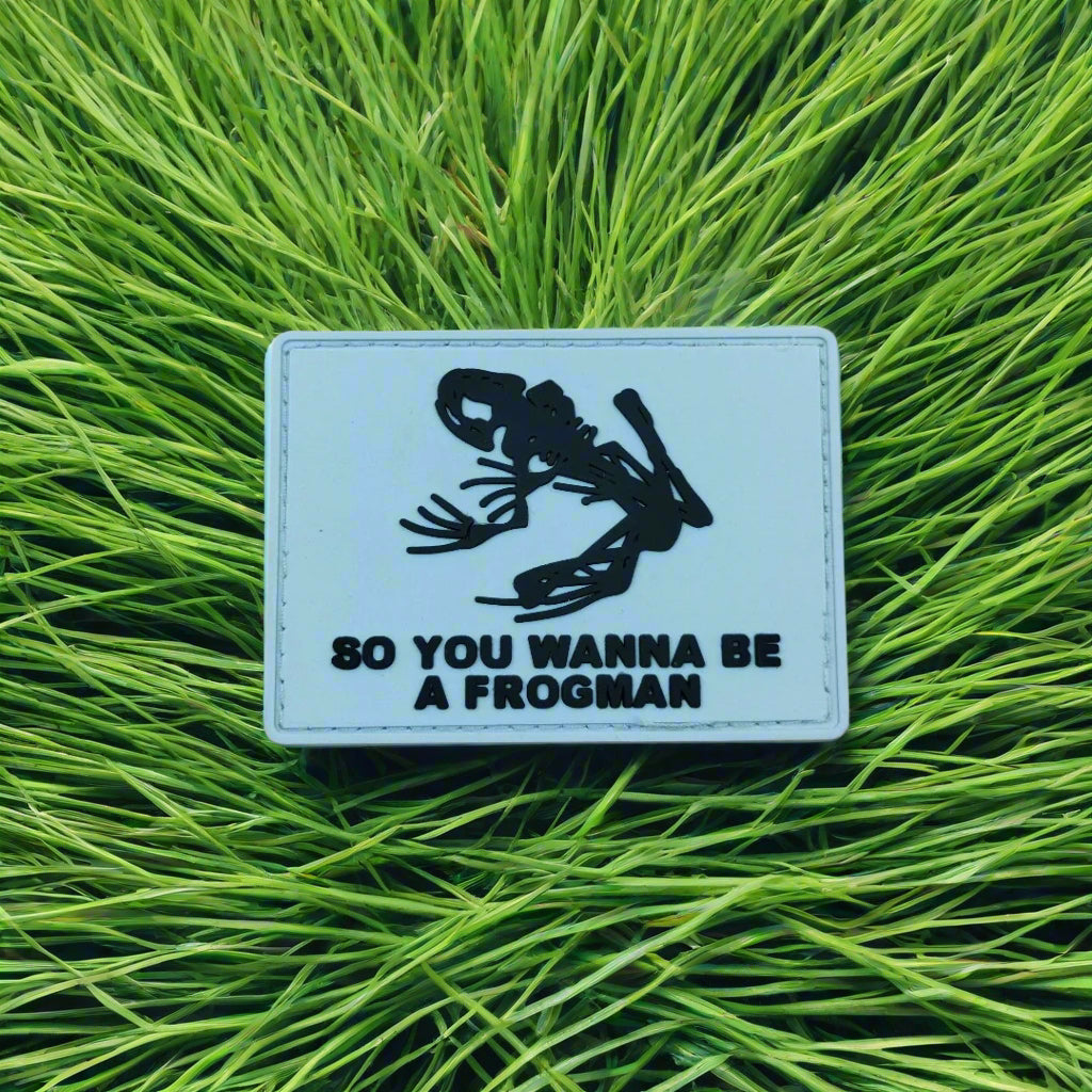 Patch with frogman skeleton design on grass