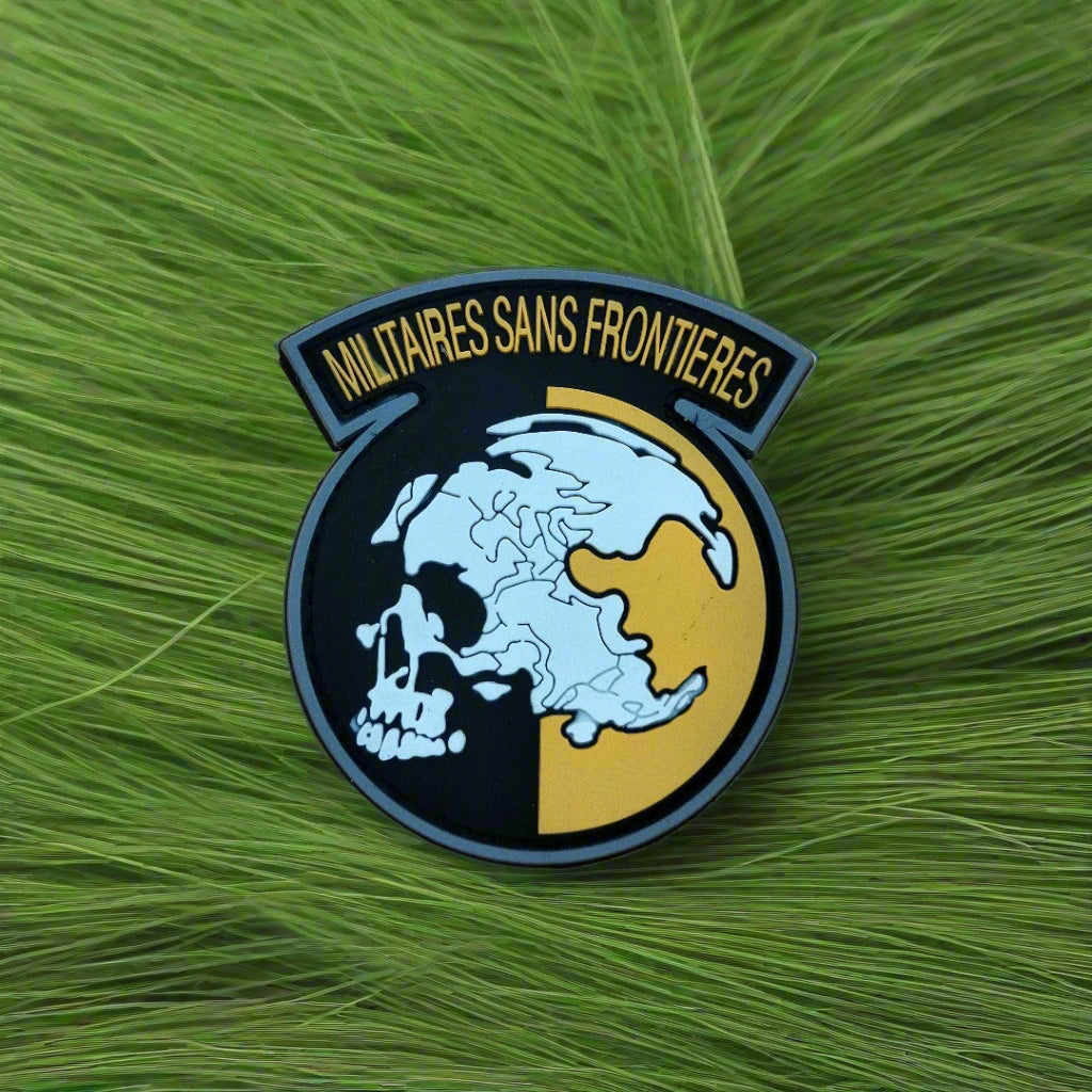 Patch with 'Militaires Sans Frontieres' text on a green leaf background