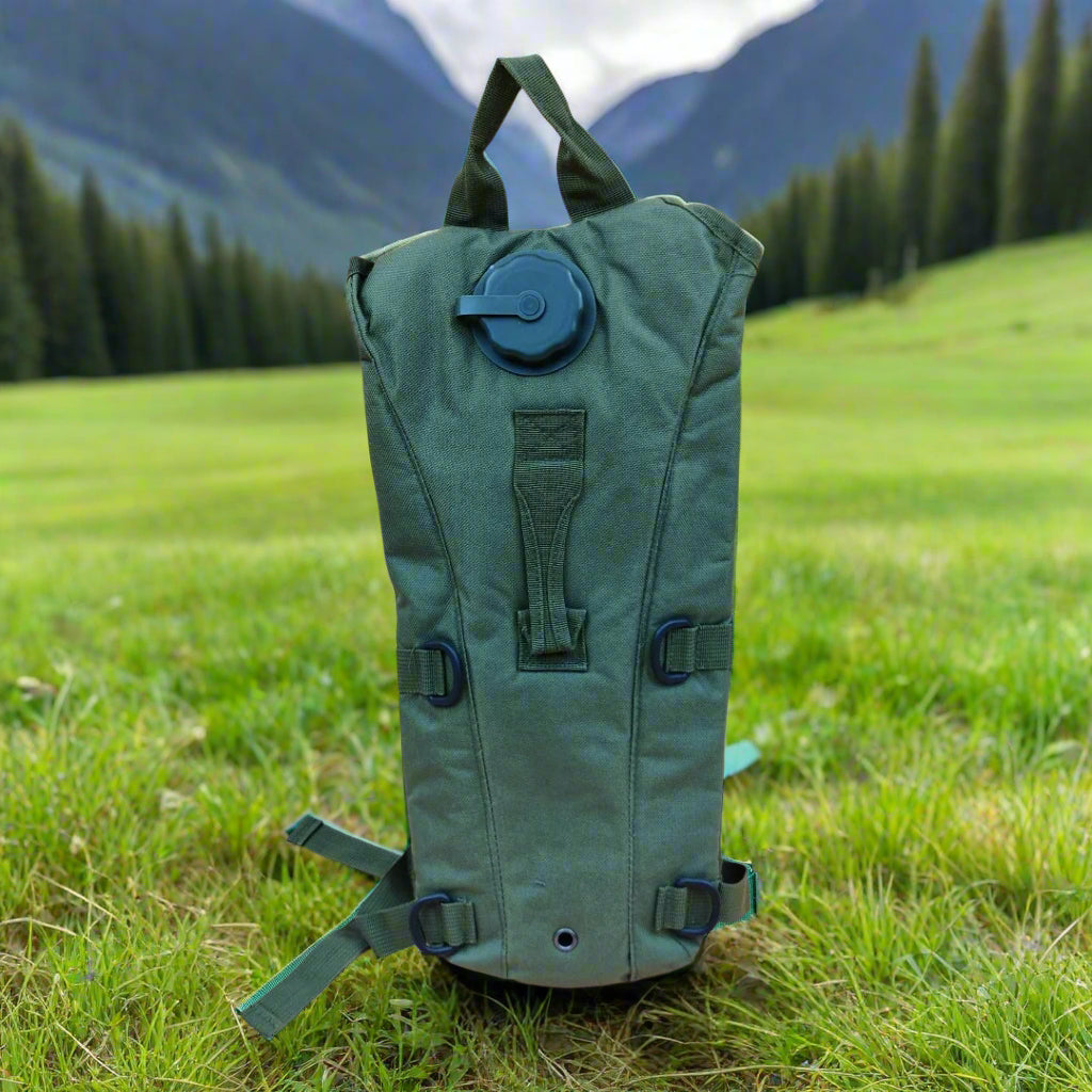 A green camel bag with a fitted bladder, pipe, and mouthpiece. It also features an extra flat compartment at the back for storage.