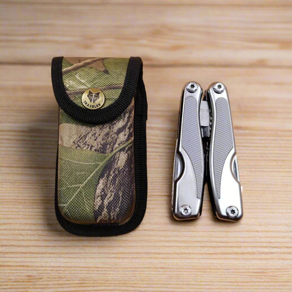 A multi-tool opened to display a knife, scissors, and other tools