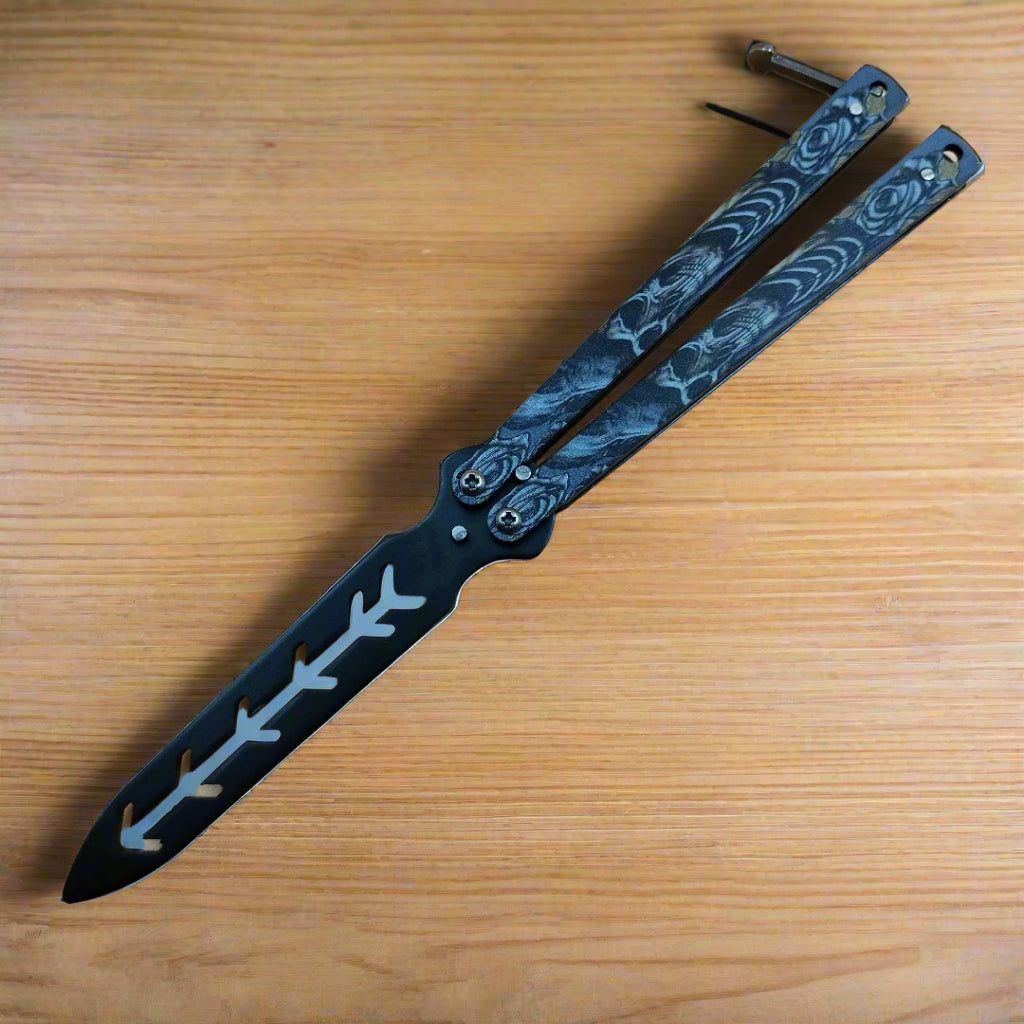 folding training blade with decorative handle