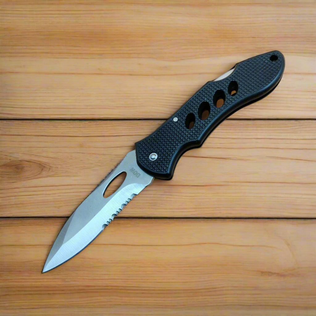 A folding hunting knife with a silver blade, black handle, and flipper opening mechanism.