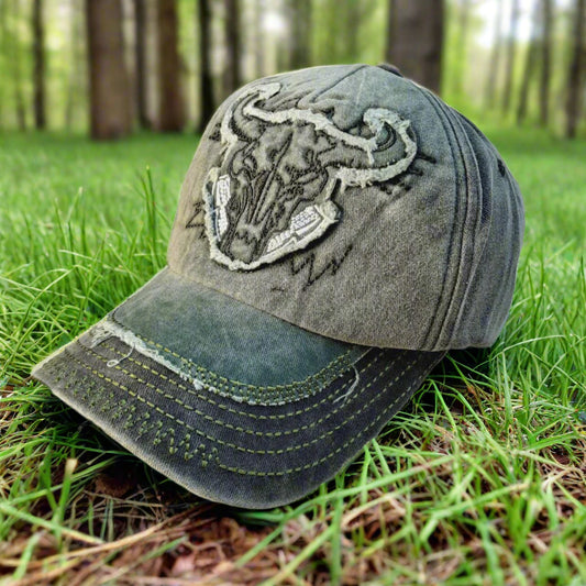 Vintage-style cap with a worn look on a white background