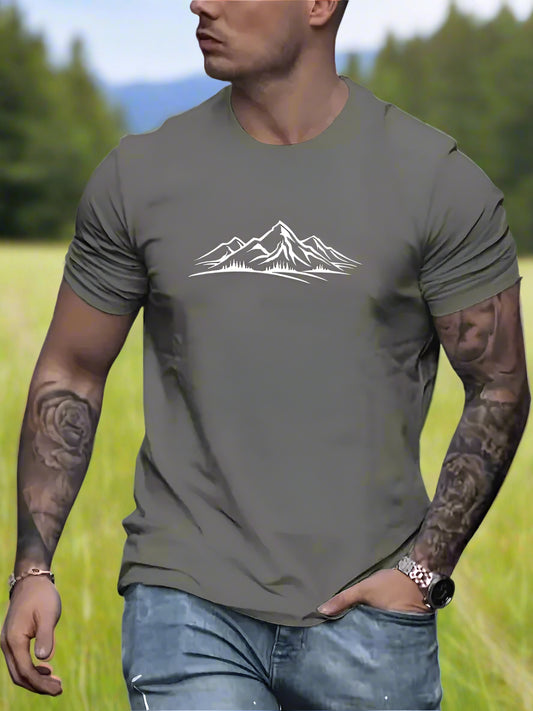A person wearing a green T-shirt with a white mountain design on the front.