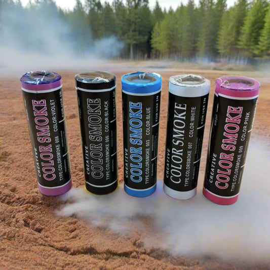 A series of six smoke grenades in different colors, each labeled with the brand 'Color Smoke'. The colors include green, blue, purple, yellow, and black.