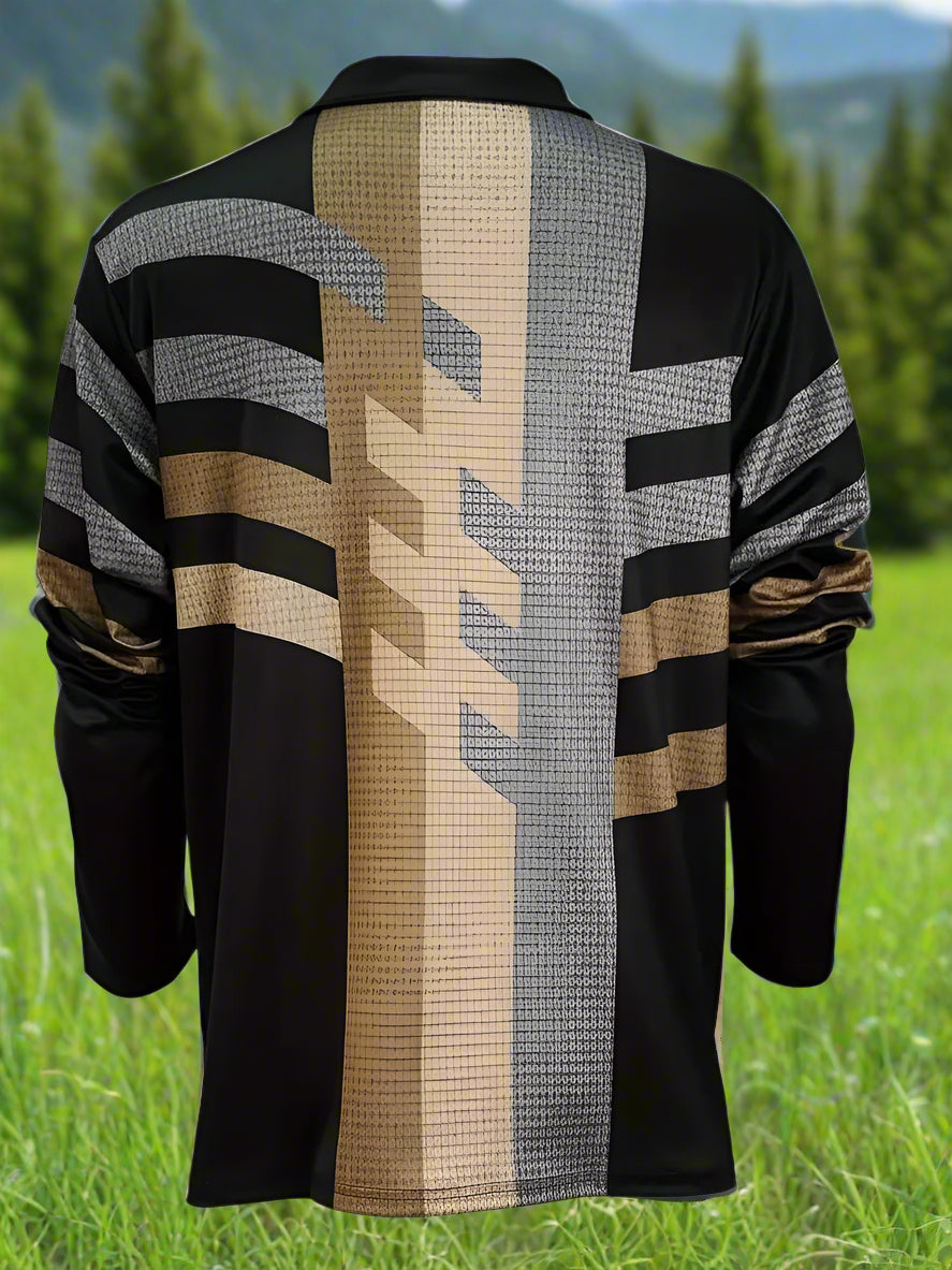 A man wearing a long sleeve gold and black striped shirt with a crew neckline