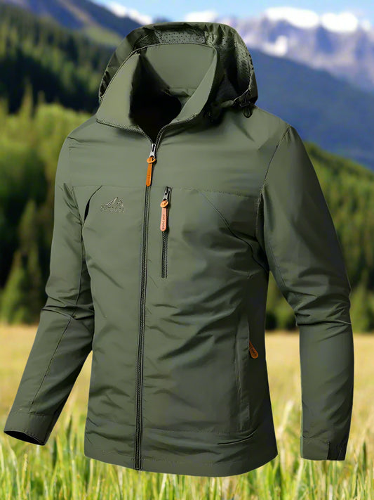 A green soft-shell jacket with a removable hoodie, long sleeves, and a hooded collar. The jacket is zipperpered and appears to be lightweight with space for pockets or branding on the chest area.
