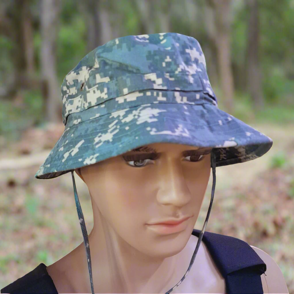 Camouflage bucket hat on a mannequin head against a beige background