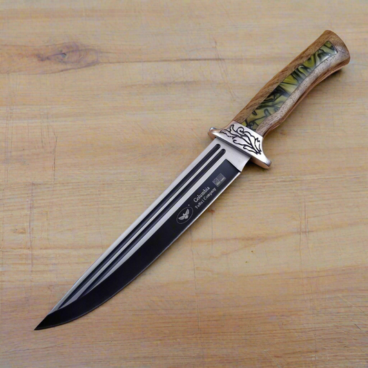 Knife with a wooden handle on a wooden surface