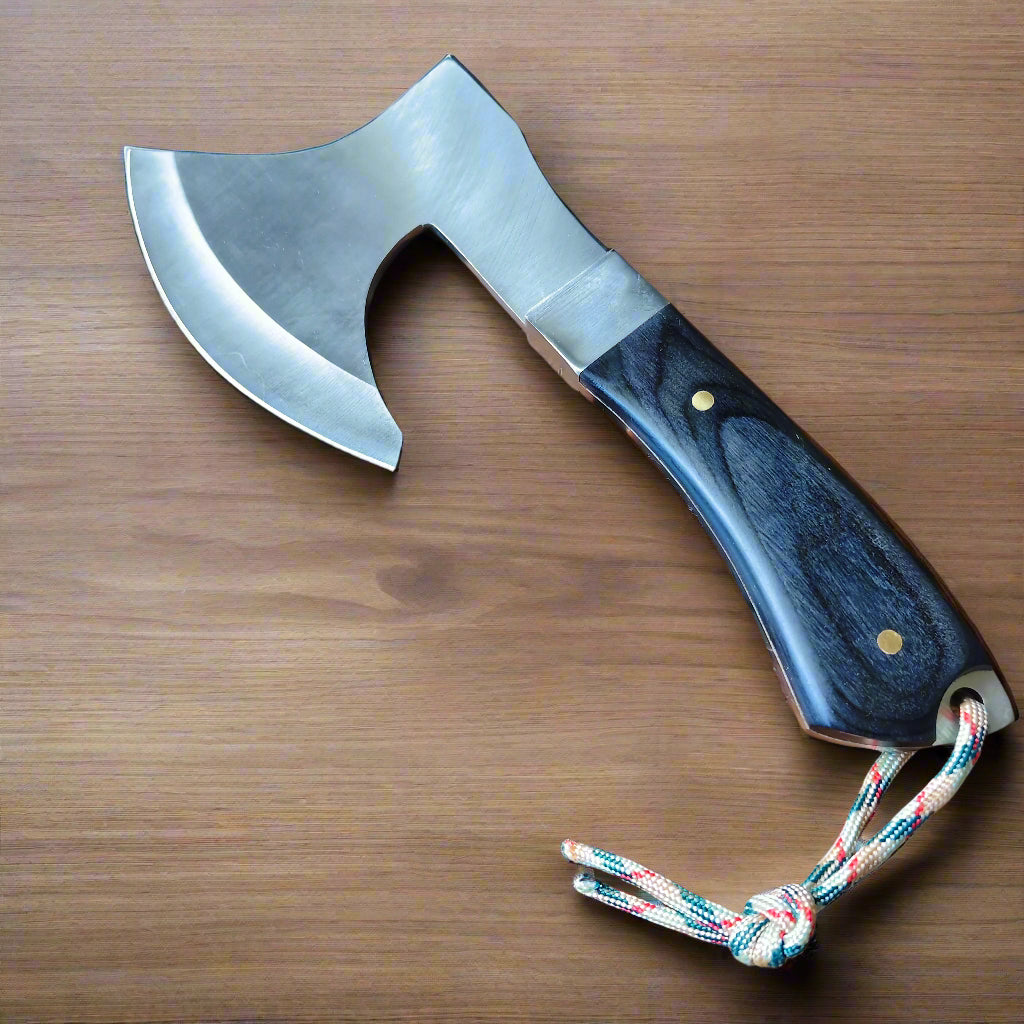 Axes with a wooden handle and metal blade on a wooden surface