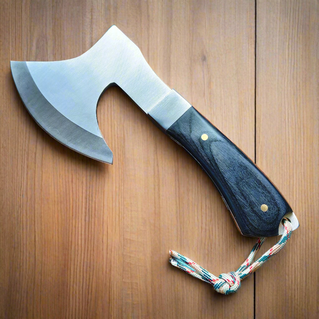 Axes with wooden handles on a wooden surface