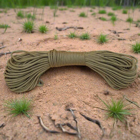 Khaki paracord coiled on a beige background with 'Blades & Outdoor' logo.
