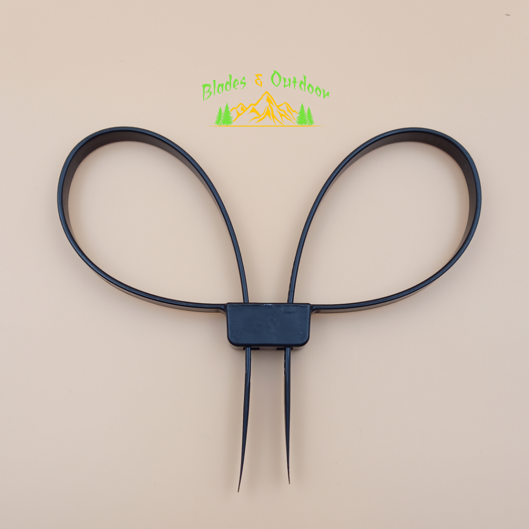 A pair of black handcuffs connected by a zip tie.