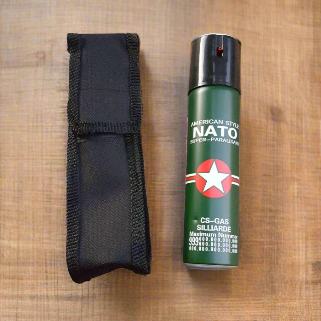 A green canister of pepper spray with a red star logo and text that includes 'NATO' and 'CS-GAS'.