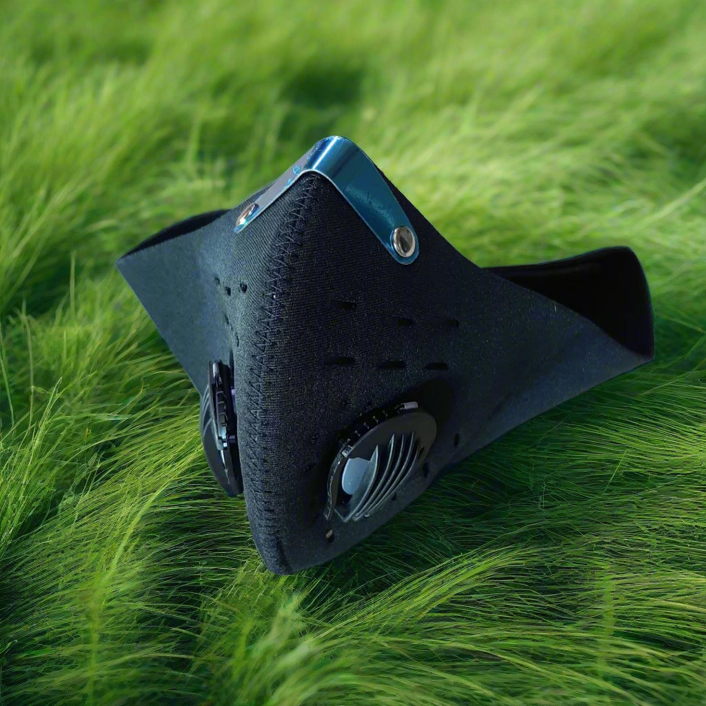 A black sports mask with double valves