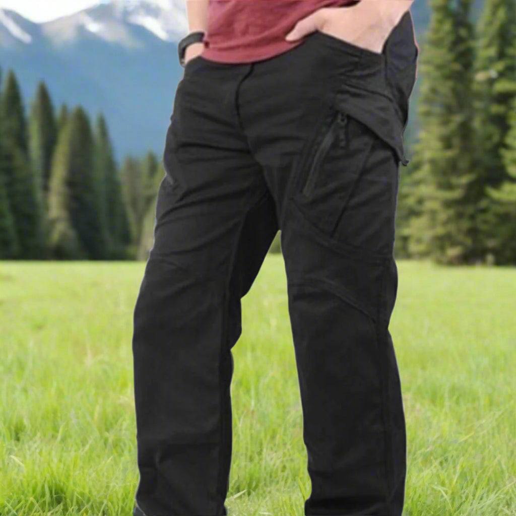 A pair of stretchable trousers in black color displayed with a price tag in red text, indicating sizes XL, 2XL, and 3XL are available.