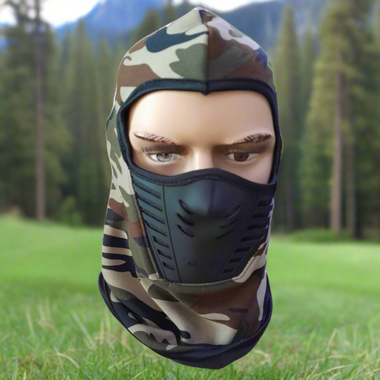 Camouflage balaclava worn by a mannequin head with a forest background
