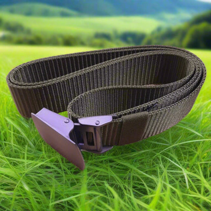 green belt with a purple buckle on grass