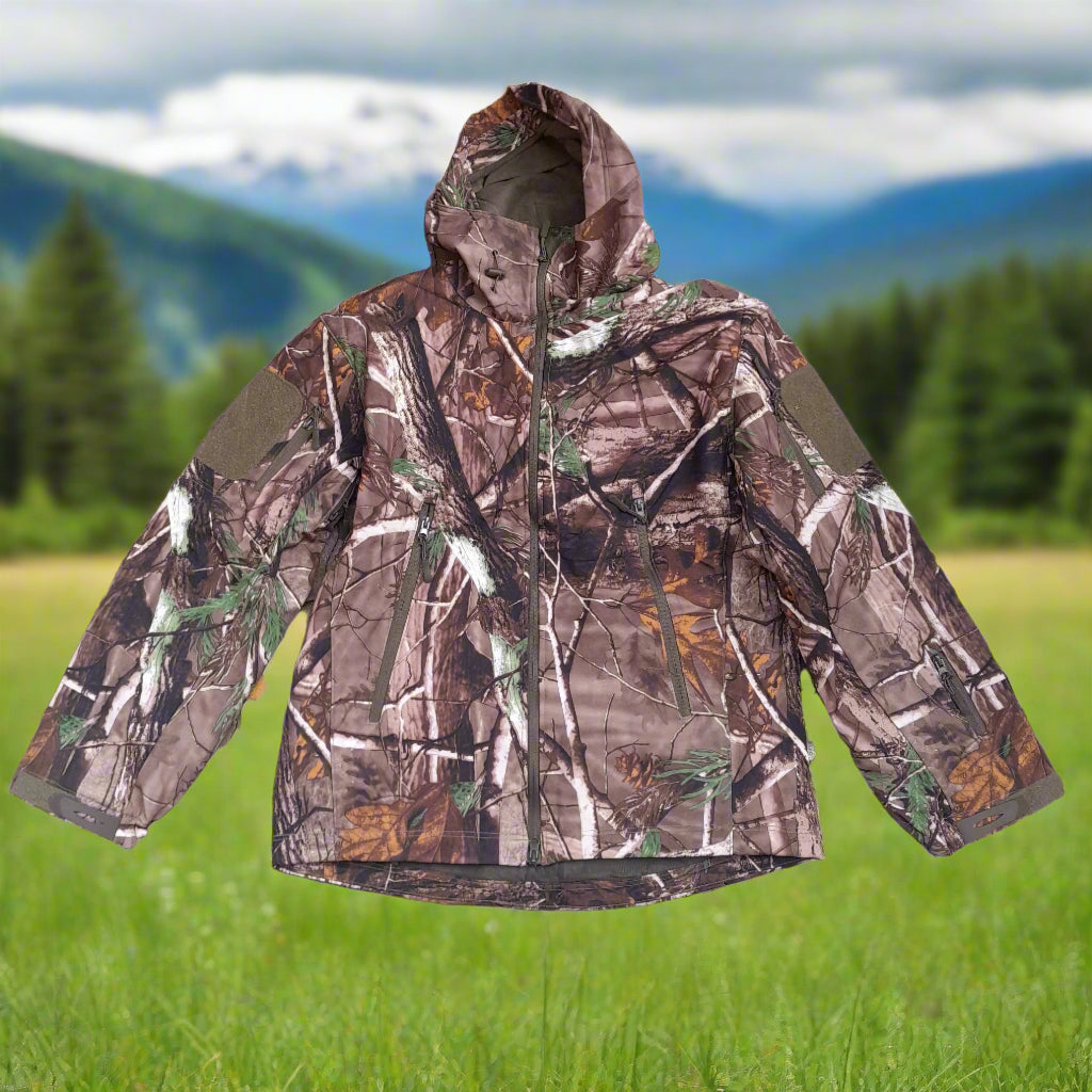 Soft Shell jacket. Jacket has multiple zippers and a hood.