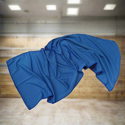 Blue towel draped over a surface with a blurred indoor background