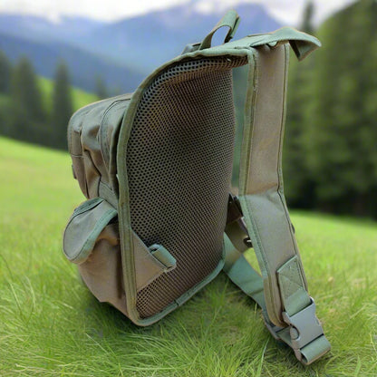 A khaki crossover bag with multiple compartments and zipper closures. It has adjustable straps and appears to be made of canvas material.