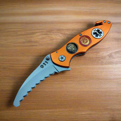 Folding knife with decorative handle on a wooden surface