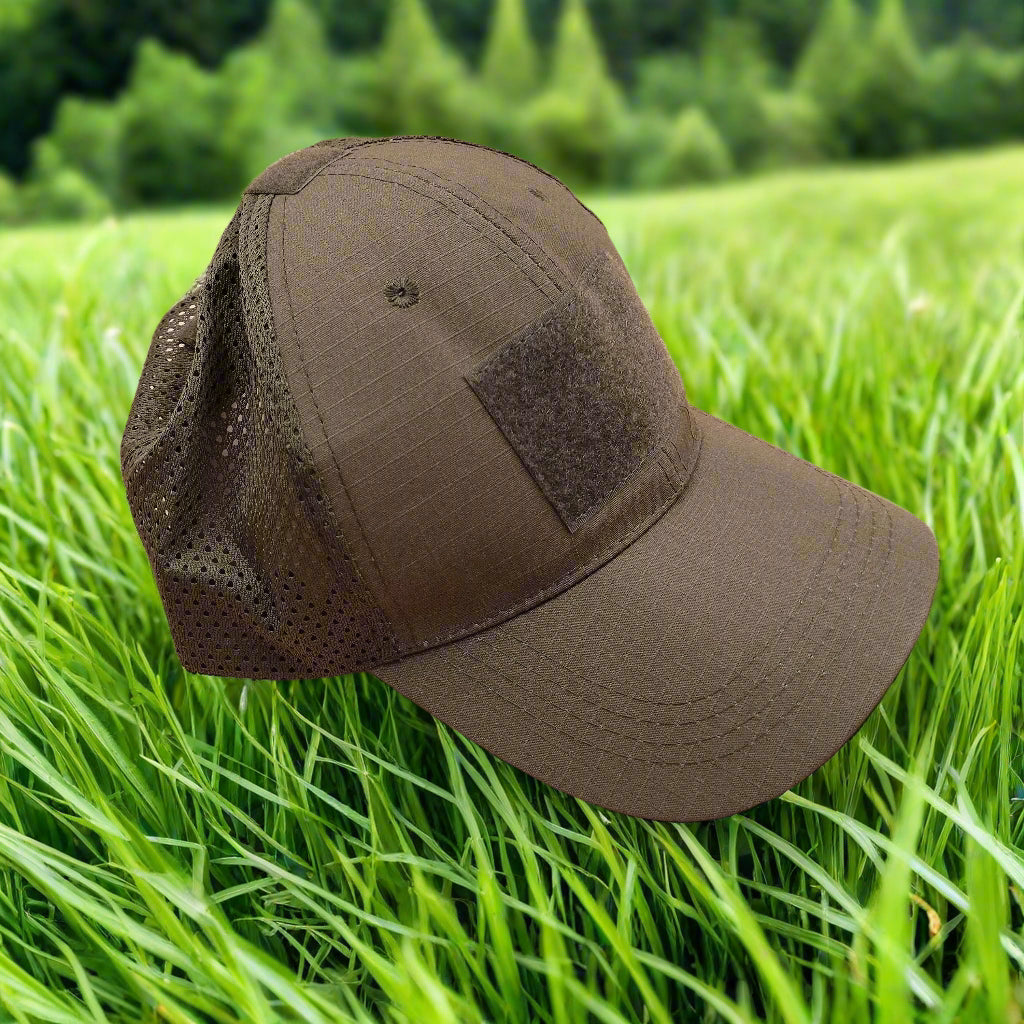Khaki baseball cap with mesh back on a beige background