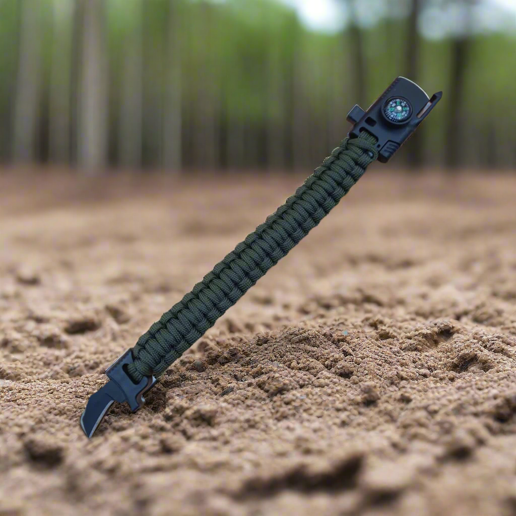 Paracord bracelet with blade and fire starter