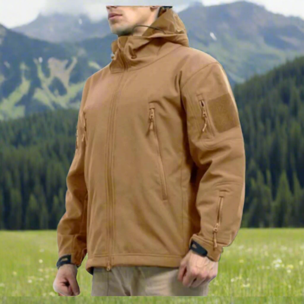 Soft Shell jacket. Jacket has multiple zippers and a hood.