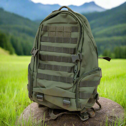 Green tactical backpack on a beige background