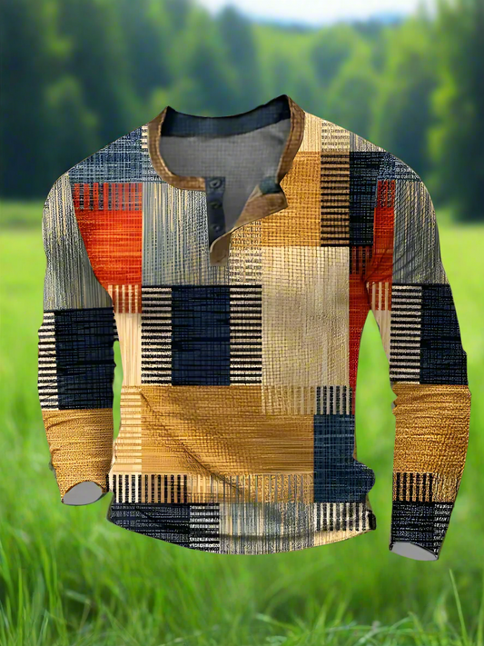A long sleeve men's shirt with a geometric block print pattern in mixed colors, featuring a button-up front.