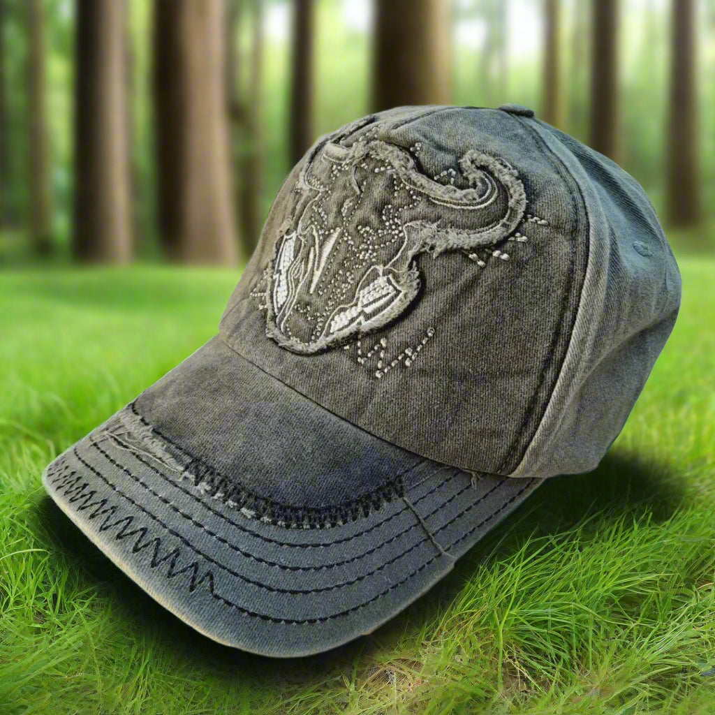 Gray cap with bull skull design on a white background