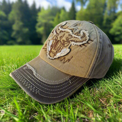 Cap with bull emblem design on a white background