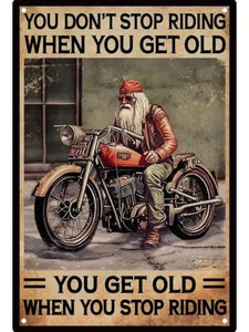 Tin sign - old man with beard on motorcycle