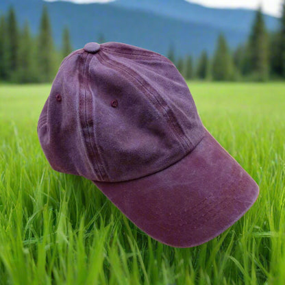 Pink baseball cap on a beige background