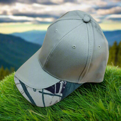 Khaki baseball cap with a patterned brim on a beige background