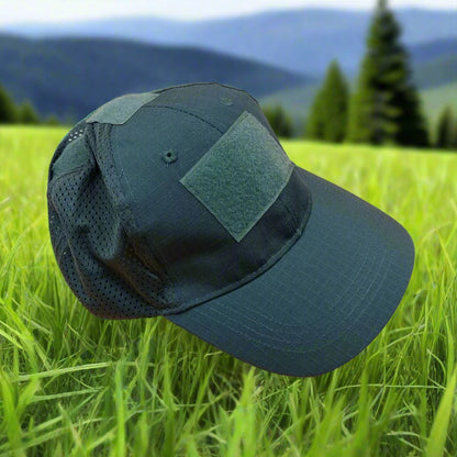 Green cap with mesh side and patch on a beige background