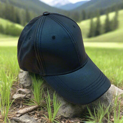 Dark oil skin cap on a beige background