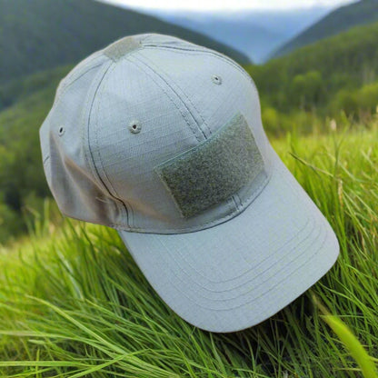 Khaki cap with a patch on a beige background
