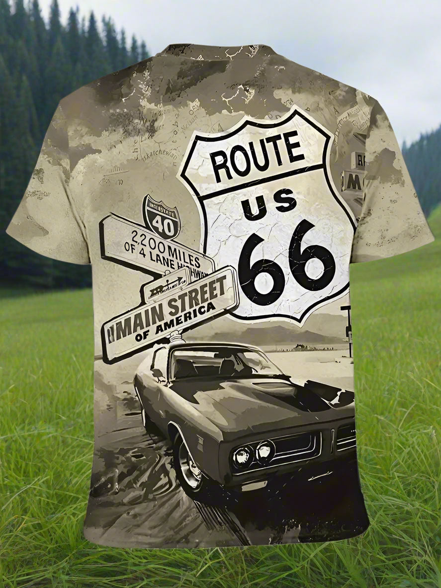 A person wearing a short-sleeved beige t-shirt with 'ROUTE US 66' text and an image of a classic car on it.