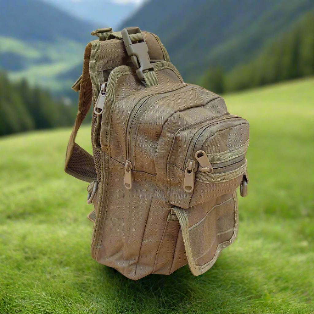 A khaki crossover bag with multiple compartments and zipper closures. It has adjustable straps and appears to be made of canvas material.