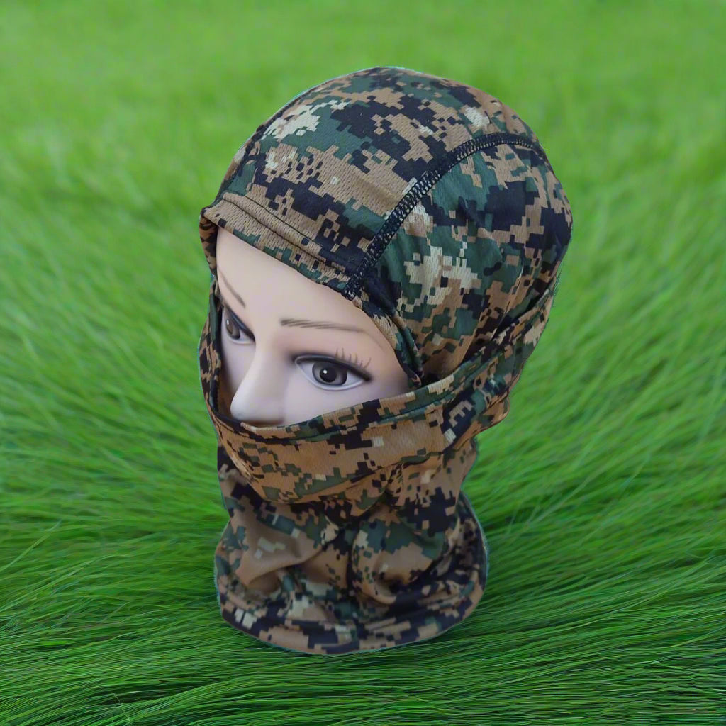 A person wearing a camouflage patterned full face mask covering.