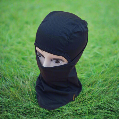 A person wearing a black full face mask covering.