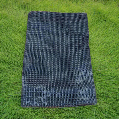 Folded blue textured towel on a beige background