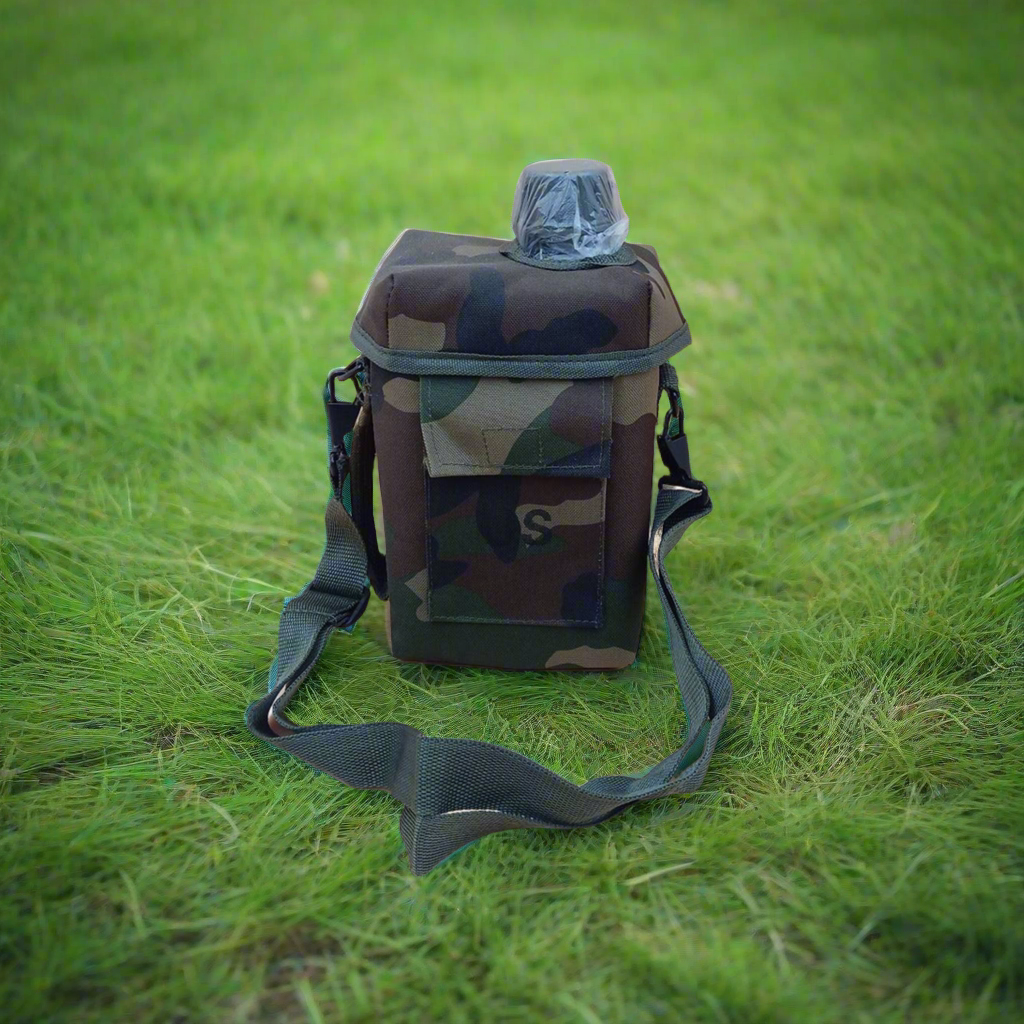Water bottle surrounded by grass 